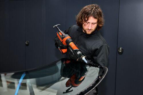 Collage de pare-brise