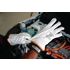 Short electric insulating gloves with mechanical resistance